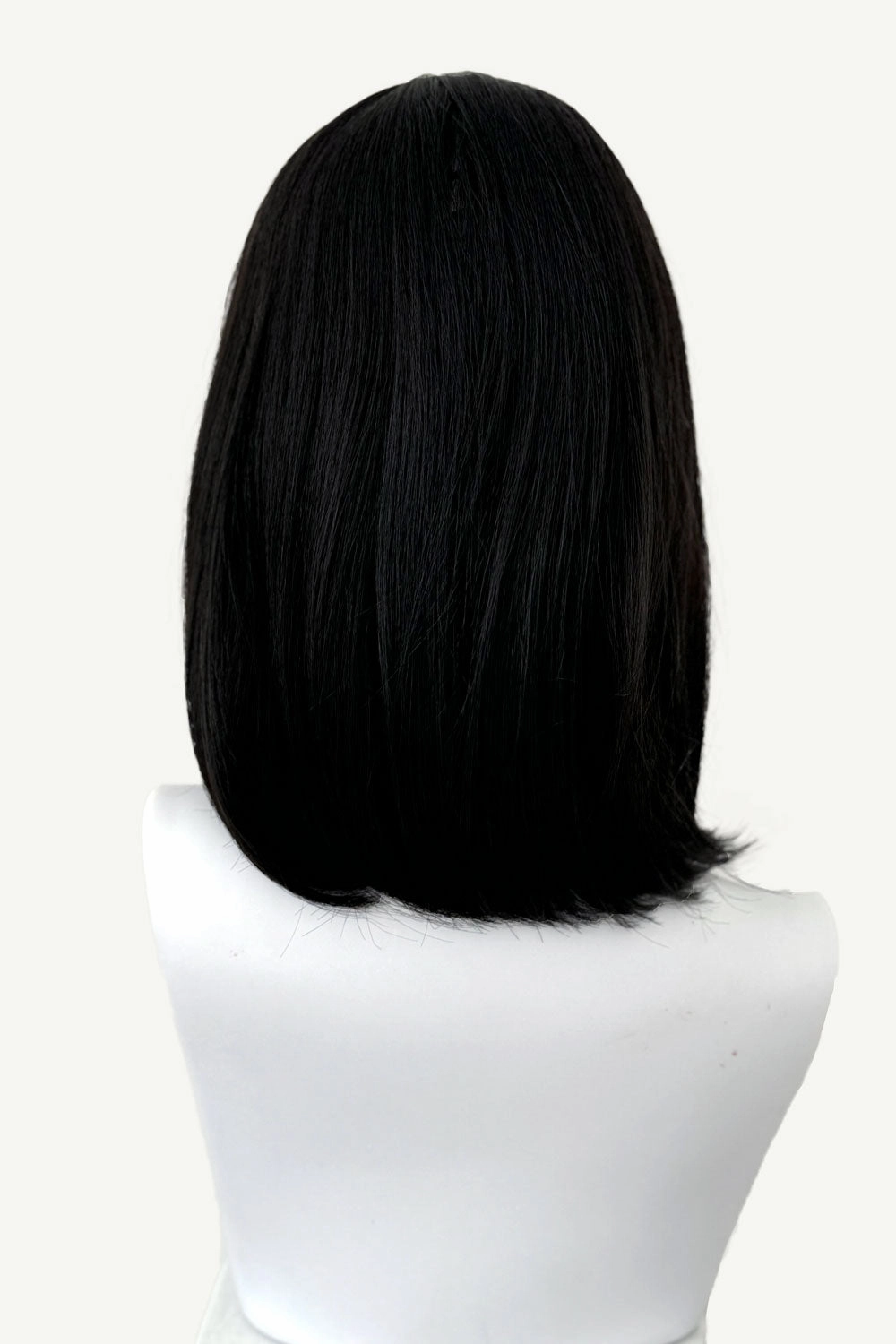 Black long bob wig with a short retro, rockabilly-style fringe: Beth