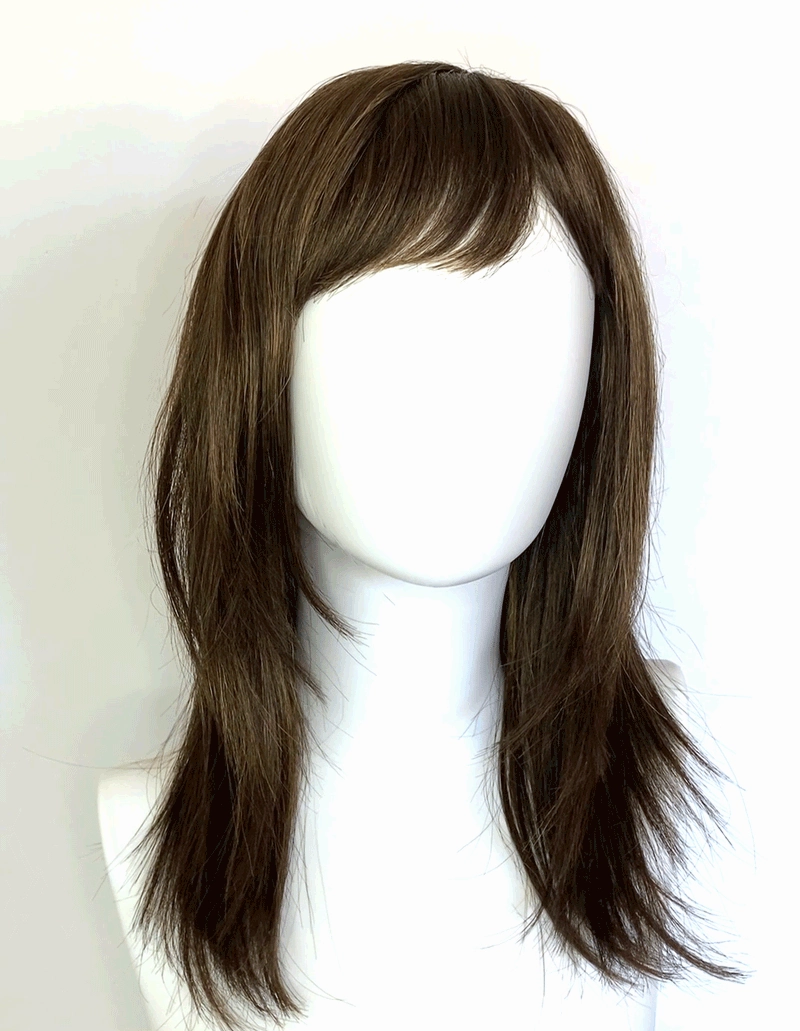 Chocolate brown wig with blonde highlights, face frame style: Katie