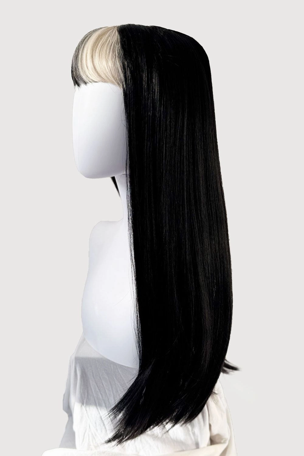 Long, black, straight wig with platinum fringe streak and retro, straight fringe: Imogen