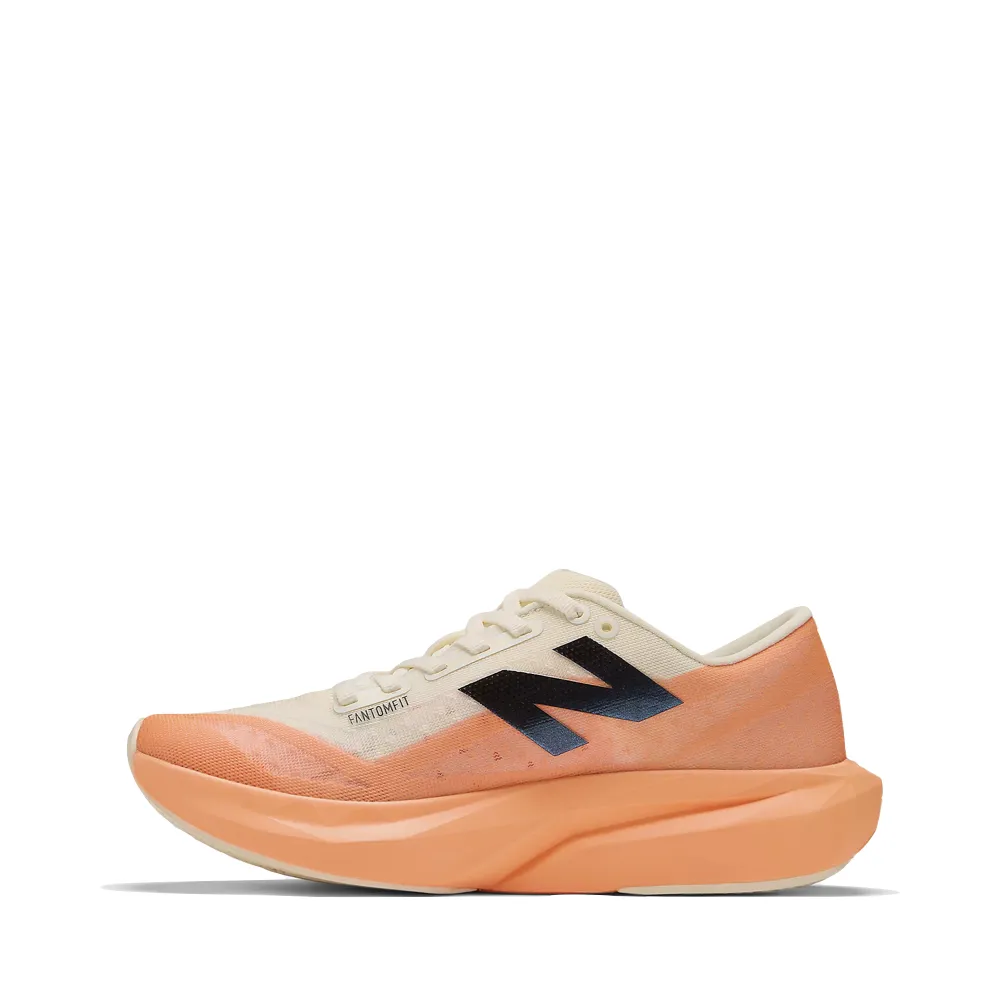 New Balance Women's FuelCell Rebel v4 Sneaker in Hot Mango/Angora/Black