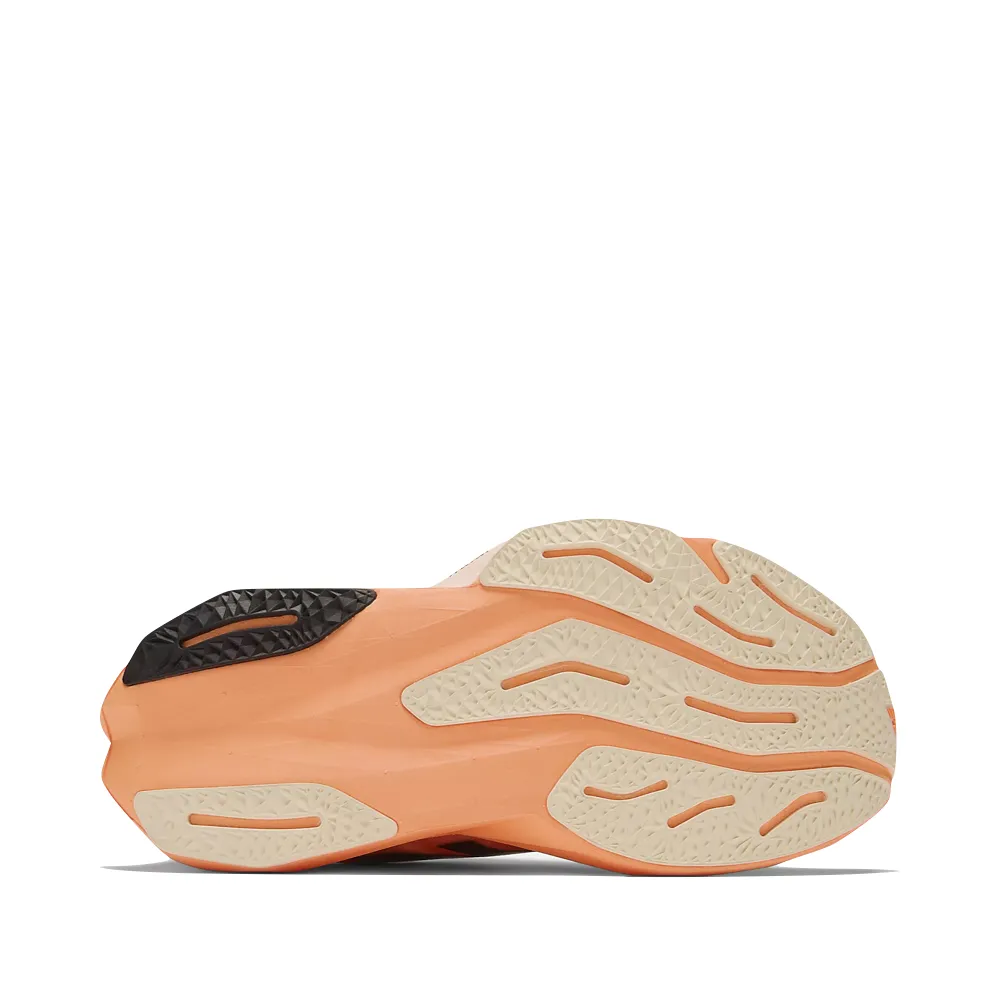 New Balance Women's FuelCell Rebel v4 Sneaker in Hot Mango/Angora/Black