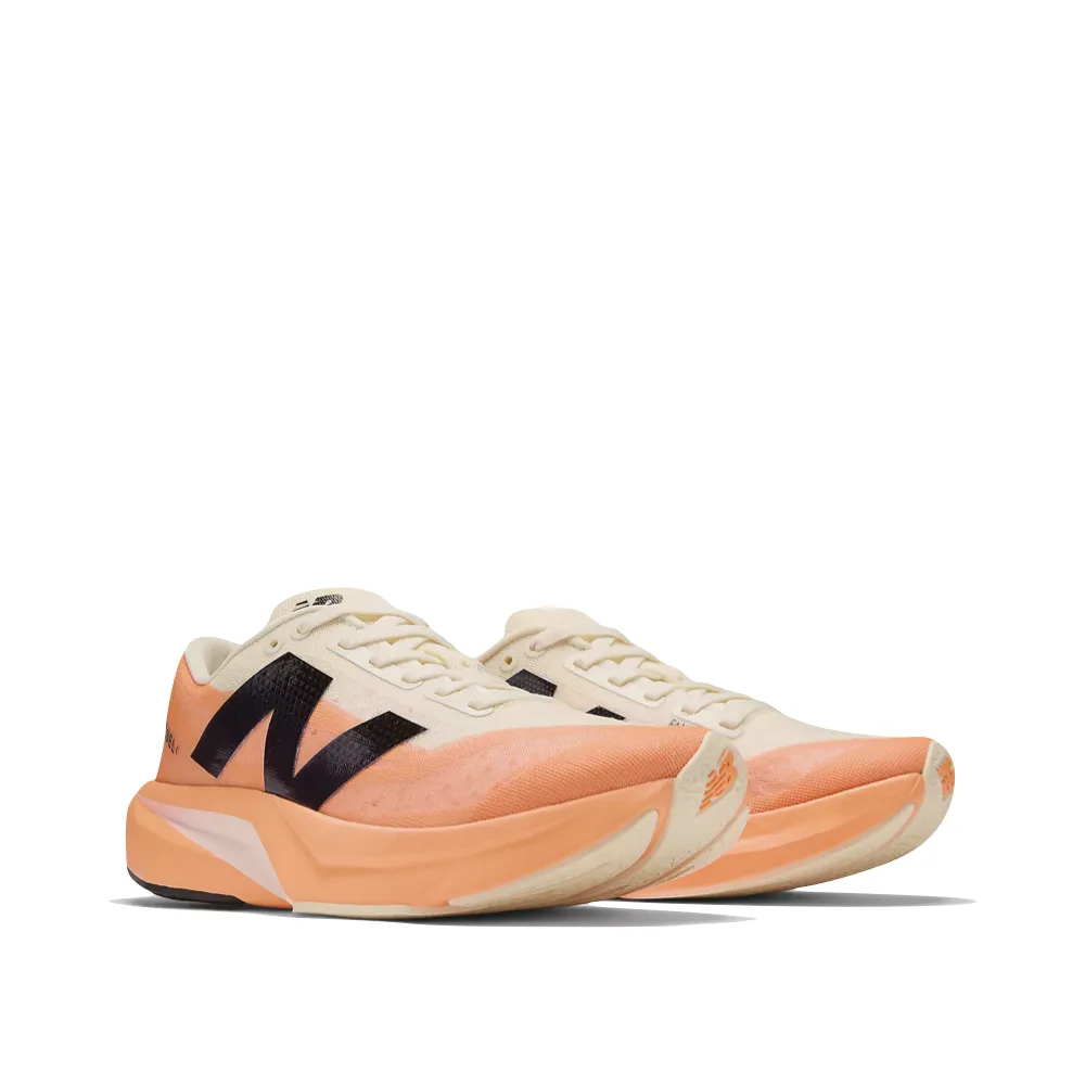 New Balance Women's FuelCell Rebel v4 Sneaker in Hot Mango/Angora/Black